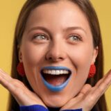 Full mouth dental implants supporting a fixed full arch bridge for seniors