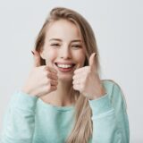 Healthy aligned teeth after malocclusion treatment